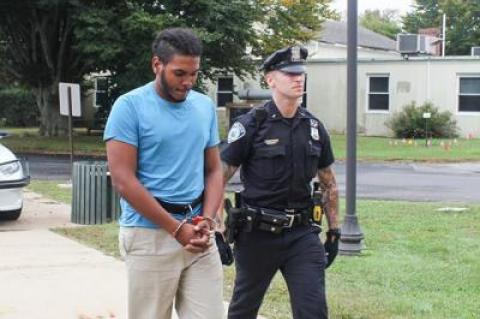 Luis Baldayac, who was arrested on two counts of burglary in the second degree in connection to a break-in at the Lido Motel in Montauk on Sunday, was led into East Hampton Town Justice Court on Tuesday morning.