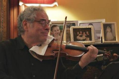 Itzhak Perlman in a scene from “Itzhak,” a documentary having its world premiere as the opening night film of the Hamptons International Film Festival.