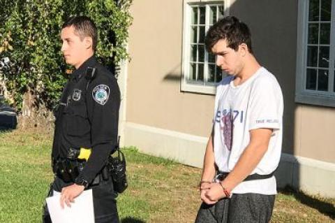 Richard Anthony Grigonis, 24, of Sag Harbor was led away from East Hampton Town Justice Court Sunday after being arraigned on four charges, the most serious of which is a felony charge of possession of a quantity of LSD.