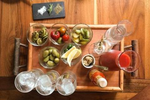 Nick and Toni’s Bloody Mary Board invites patrons to blend their own drinks using various alcohol options, their own mix or straight tomato juice, and a number of garnishes.