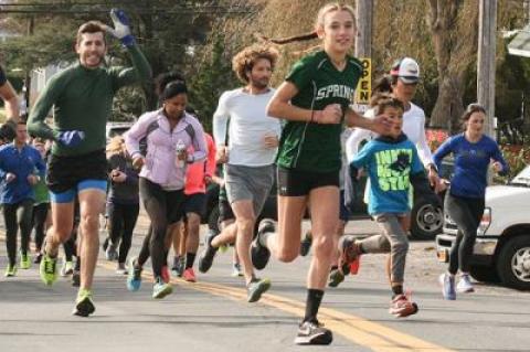 Isabella Tarbet, facing the camera above, an East Hampton High School ninth grader and cross-country standout, was first among the Dock Race’s female contestants.