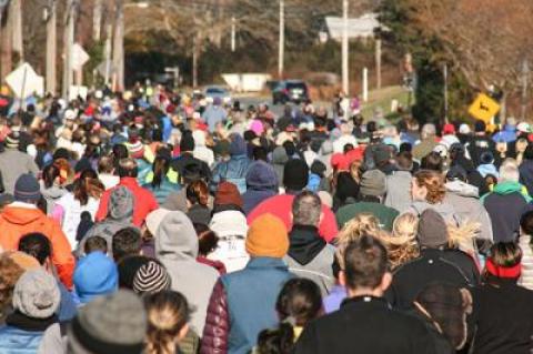 Thanksgiving Day’s Turkey Trot turnout was the largest yet, as the above photo, taken as the hordes headed up Montauk’s Edgemere Road, ought to attest.