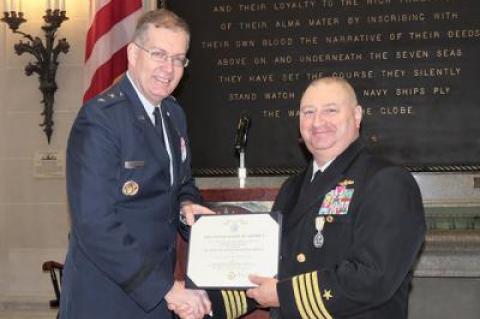 Major Gen. Mark Westergren of the Air Force presented Navy Capt. Joseph Pugh of Montauk and Edgewater, Md., with a Defense Superior Service Medal and the New York State Conspicuous Service Cross at his retirement ceremony on Friday at the United States Naval Academy in Annapolis, Md.