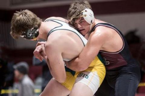 Andreas Koutsogiannis, at right, was an East Hampton champion in Saturday’s Sprig Gardner tournament at 195 pounds.