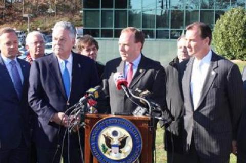 At a press conference last month, Representatives Lee Zeldin, center, Peter King, left, and Tom Suozzi, right, and other state and local officials and business interests highlighted their concerns about the proposed tax bill.