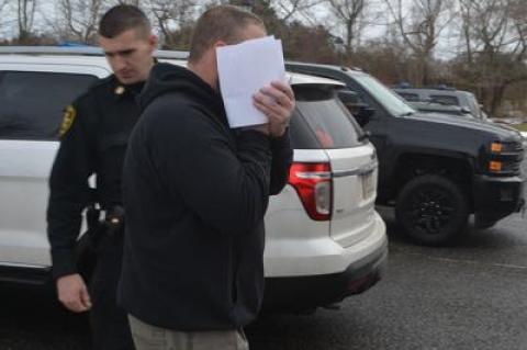 Ned Wessels, 31, was taken from Suffolk County jail to East Hampton Town Justice Court last Thursday to be arraigned on burglary charges stemming from an incident in East Hampton Village last April.