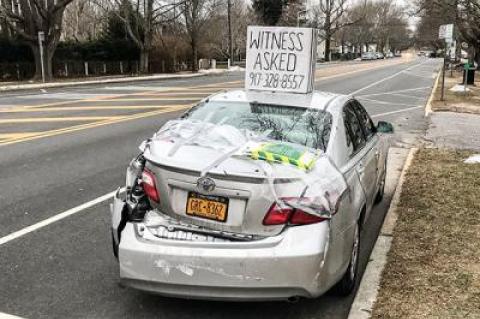 The owner of this car believes a town employee crashed a large snow blower into its rear, causing extensive damage, and is hoping a witness will come forward.