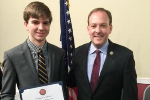 Eamon Spencer, left, with Representative Lee Zeldin.