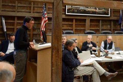 Rick Drew, left, spoke at Monday's meeting of the East Hampton Town Trustees about an increased wish-list for donations from the company planning an offshore wind turbine project that would generate up to TK megawatts of electricity. <I>Chris Walsh<P>