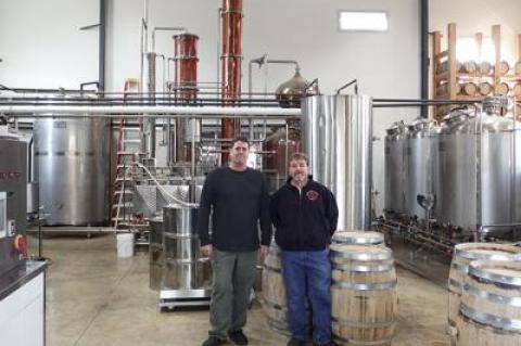 Dean Foster, right, and Matt Beamer’s Sagaponacka vodka is designed to showcase the flavor of East End produce.