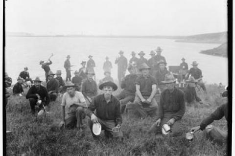 Members of the 5th Army Corps posed for a photograph in Montauk, with supperware in hand.