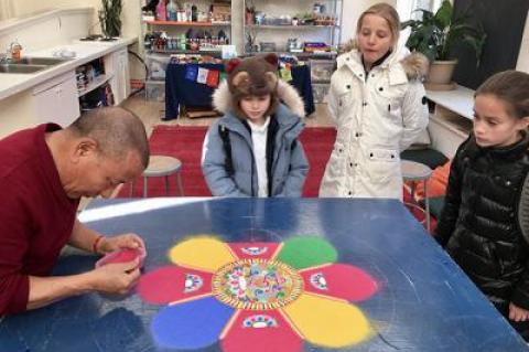 Lama Tenzin, a Tibetan Buddhist monk, constructed a sand mandala of compassion during a weeklong visit to the Ross School.