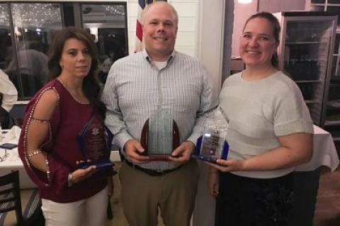 Mark Poitras received not one, but two awards from the Southampton Town EMS Advisory Committee’s dinner at the Coast Grill Friday night. He took home the Nancy Makson Award of Excellence and the Ralph Oswald Distinction for Inspirational Leadership. Pictured with him is Stacy McGowin, the Sag Harbor Volunteer Ambulance Corps Chief, and Violetta Zamorski, the head of the EMS Advisory Committee.