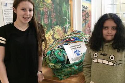 Sarah Betuel, left, and Maya Guzman, East Hampton Middle School students, are spearheading an environmental initiative launched by the Surfrider Foundation in which they plan to appeal to East Hampton restaurants and bars to go straw-free for the summer.