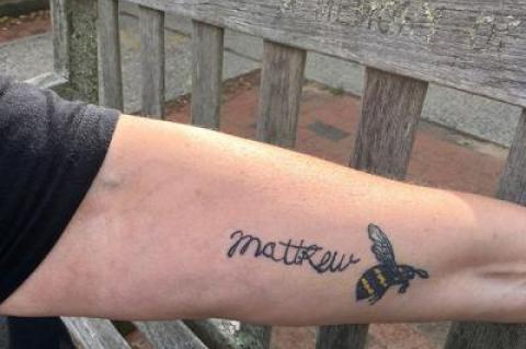 In memory of her son, Mathew, who committed suicide in 2017, Dana Lester’s tattoo pays tribute to the 17-year-old, who cared so much about bees that he planned a pollinator garden to provide them with blooms through three seasons of the year.