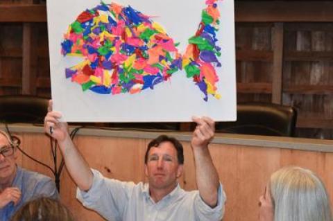 Rick Drew of the East Hampton Town Trustees held aloft a “balloon fish” made by his colleague Susan McGraw Keber.