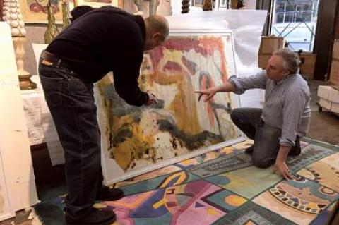 Larry Castagna, left, and David Killen examined one of the large-format drawings attributed to Willem de Kooning, part of a group of six works on paper found in a New Jersey storage locker.