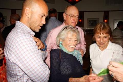 David Lys, left, looked over Betty Mazur’s shoulder as results were tallied in his Democratic primary against David Gruber. Mr. Lys won, and Ms. Mazur, a longtime committee member, was re-elected.