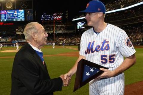 The New York Mets honored Pat DeRosa’s military service at their game last Thursday. The Mets’ Corey Oswalt presented a flag to the Montauk resident in a ceremony during the game.