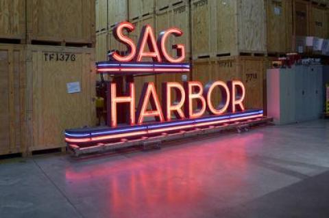 The Sag Harbor Cinema sign, which was restored after being damaged in a 2016 fire, is in storage in Bridgehampton.