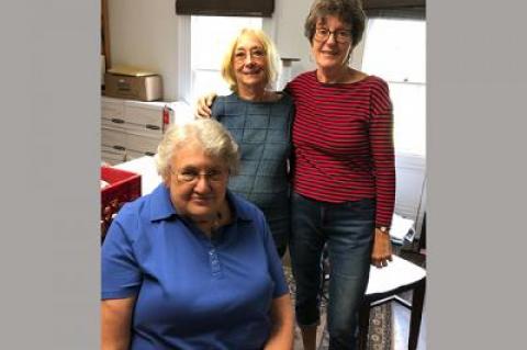 Volunteers at the Springs Library, Ethel Henn, seated, Francine Gluckman, and Jackie Wilson, are afraid the library will cease to exist unless the Springs Historical Association gets some new blood and a new state charter.