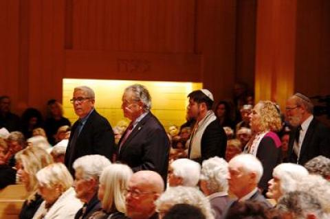 East Hampton Village Police Chief Mike Tracey, Mayor Paul F. Rickenbach Jr., Rabbi Joshua Franklin, and Rabbi/Cantor Debra Stein of the Jewish Center of the Hamptons filed into the synagogue’s packed sanctuary last Thursday evening.