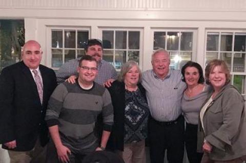 George Lombardi and his wife Antonia, third and second from right, held “a heroes dinner” for those who he said helped save his life. They are from left, East Hampton Fire Department Chief Gerard Turza Jr., Ian Hoyt, in back, Nick Calace, Suzy Dayton, and Barbara Hansen, far right.