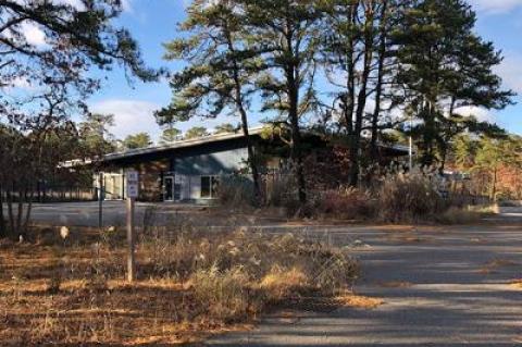 Empty for over two years, the building on town-owned property on Stephen Hand’s Path could be bought by East Hampton for a third of its appraised value.