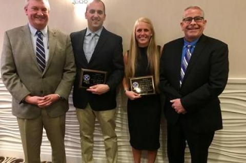 East Hampton Village Police Detective Lt. Tony Long, left, and Chief Mike Tracey, right, joined Police Officers Eben Ball and Bethany Semlear at a Southampton Kiwanis Club dinner to present them with officer of the year awards.