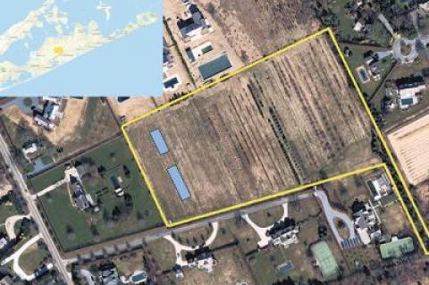 Adam Shapiro, a founder of East Rock Capital, wants permission to build worker housing, in blue, and a greenhouse on preserved farmland he owns near his house on Butter Lane in Bridgehampton.