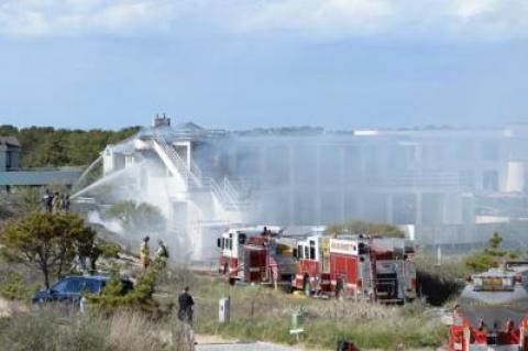 Firefighters doused flames, quickly putting a stop to a fire that spread from a Dumpster to the house.