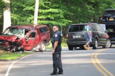 The East Hampton Fire Department extinguished a fire under the hood of the minivan involved in a two-car accident on Cedar Street in East Hampton on Monday morning.