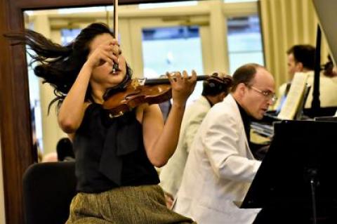 At one of last year’s Bridgehampton Chamber Music Festival concerts, Kristin Lee demonstrated some rigorous violin playing while Orion Weiss was at the piano.