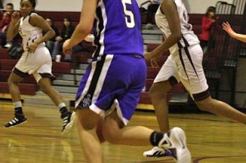 Sarah Johnson, at right, has been improving by leaps and bounds, according to the East Hampton girls basketball coach, Howard Wood.