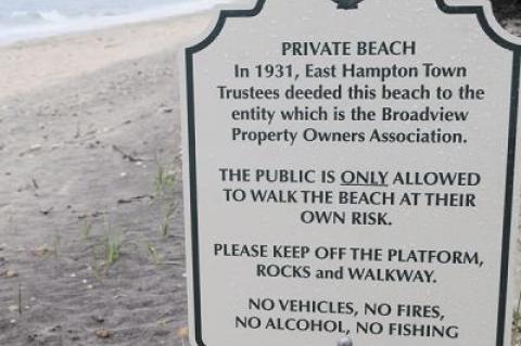 The East Hampton Town Trustees say that the sign on the beach at Barnes Landing in Amagansett is misleading. The area below the high-water line is public land, the trustees say, and fishing is therefore an allowable activity.