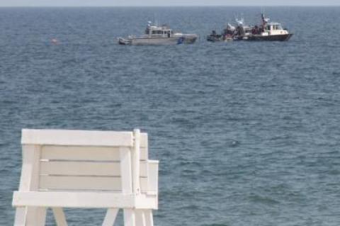 Boats searched the waters near the crash site off Indian Wells Beach on June 8, the day the plane's wreckage was found.