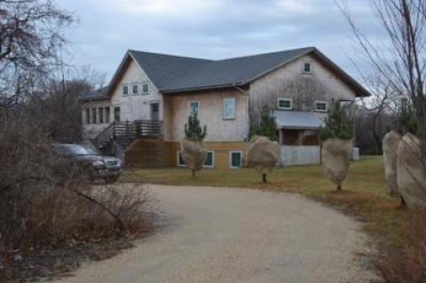 The town reportedly never noticed there was no access to the basement from the interior of the house, a violation of town code, until the final inspection.