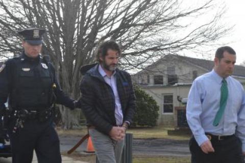 Kyle Lynch, seen here in February 2017 being brought into East Hampton Town Justice Court, was sentenced to two to six years, but will serve most of the sentence on parole if he completes a drug treatment program.