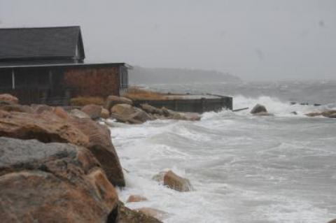 During Tuesday's northeaster, water lapped at the shore along Gerard Drive in Springs, one of several low-lying areas in the town that are particularly vulnerable to storms and the threat of rising sea level.