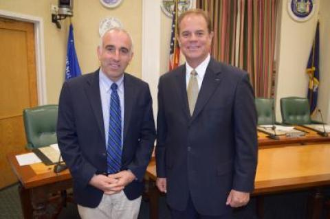 Steven E. Skrynecki, right, will not start working full time as the Southampton Town police chief until mid-March, an arrangement that Supervisor Jay Schneiderman said will save the town money.