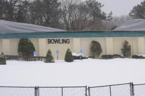 Part of East Hampton Bowl's roof collapsed under the weight of the snow at the end of January. The building will be demolished soon to make way for new retail space.