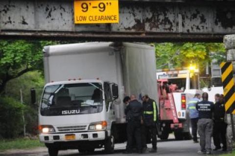 A box truck became wedged under the Accabonac Road overpass on Thursday afternoon, the second such bridge strike this week.