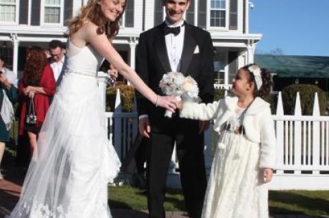 Tara and Kevin O’Brien, newlyweds, posed for photos after their wedding ceremony at the Hedges Inn in April, overcoming a bitter permitting dispute between East Hampton Village and the inn.