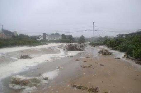 At the height of the storm, the ocean flowed into the Ditch Plain community through the town parking lot at the East Deck Motel.