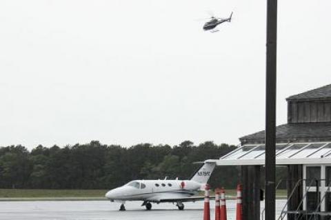 Town officials on Friday announced that they had revoked a license agreement with Fly Blade, which offers scheduled and charter helicopter flights to East Hampton Airport.