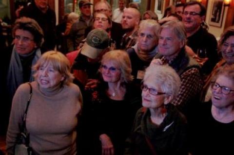 Jeanne Frankl, second from right, a co-chairwoman of the East Hampton Town Democratic Committee, watched Election Night results at Rowdy Hall. Ms. Frankl said this week she is pleased with the Democrats’ strong showing in November, but hopes a greater percentage of people will see the importance of voting in local elections.