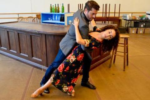 Omar Lopez-Cepero as Juan Peron and Arianna Rosario as Eva Peron perform a tango in Bay Street Theater’s production of “Evita.”