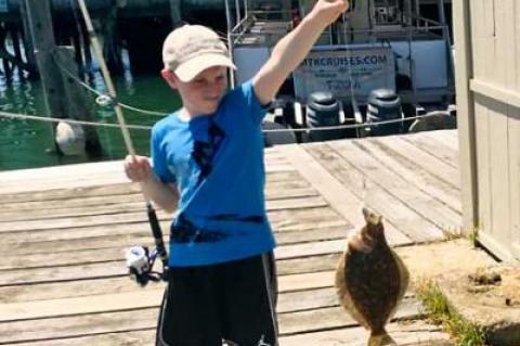 McCoy Gosman caught this fluke off Gosman’s Dock in Montauk fishing with his grandfather John Bennett.