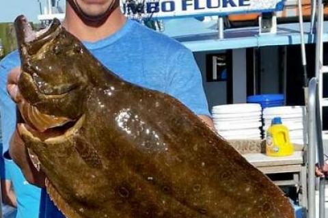 Orson Frisbee held an 11-pound, 8-ounce fluke caught on the Lazybones out of Montauk.