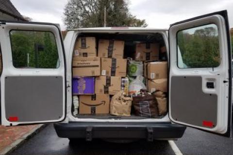 Donations from the East Hampton office of Saunders Associates for the East Hampton Food Pantry filled the back of a cargo van. A food drive at the real estate firm's various offices brought in more than 14,000 donated items.